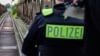 deral Police officers stand by a frequently used route by migrants across the German-Polish border near Forst, eastern Germany on October 11, 2023, during a patrol near the border with Poland.